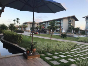 Flat Luxo Térreo Resort Pé na Areia Piscina Privativa